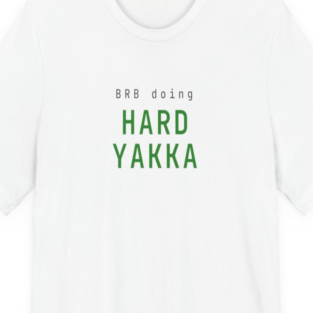 Black t-shirt with "BRB Doing Hard Yakka" text in amber terminal-style font on dark background