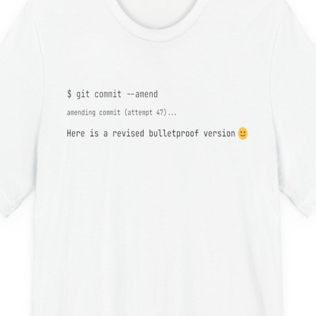 Black t-shirt with "Here Is a Revised Bulletproof Version" text in monospace font, developer humor design