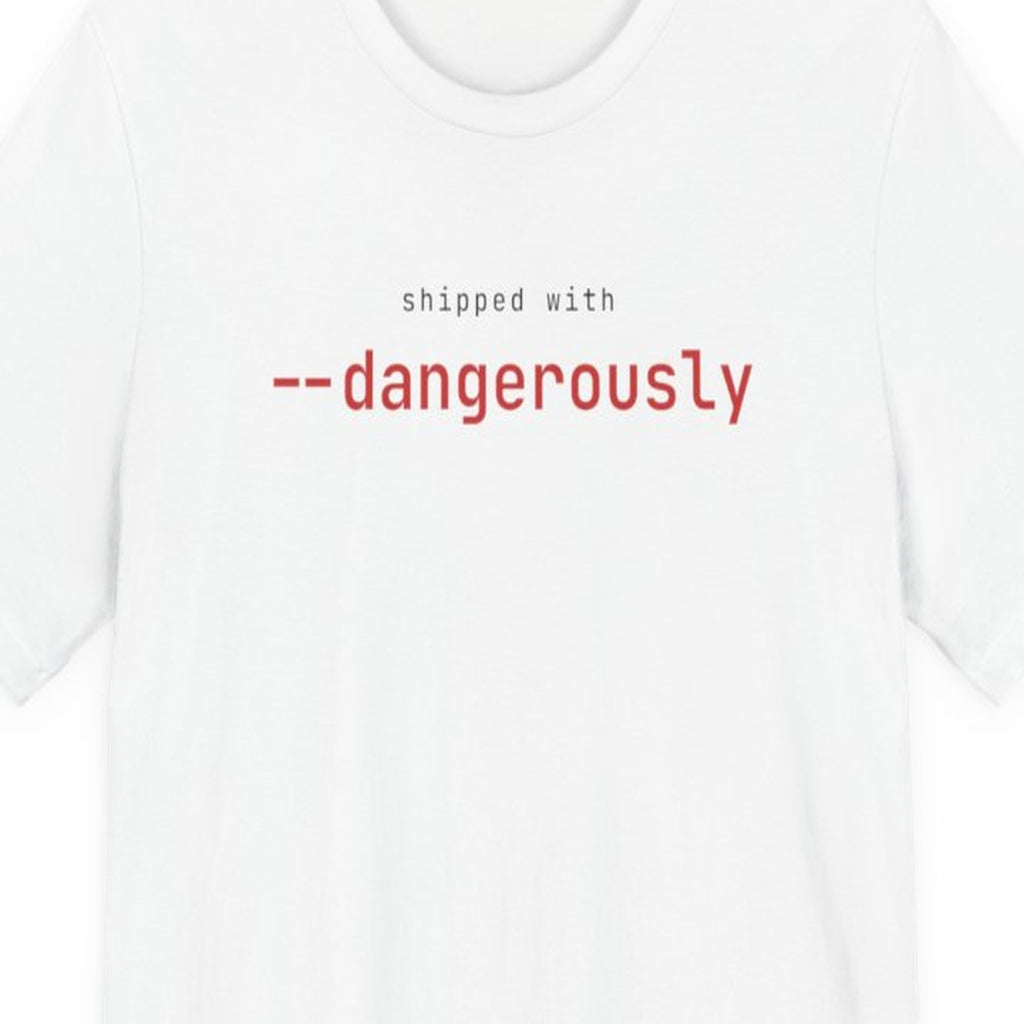Black t-shirt with "Shipped with --dangerously" text in terminal-style font, coding humor design