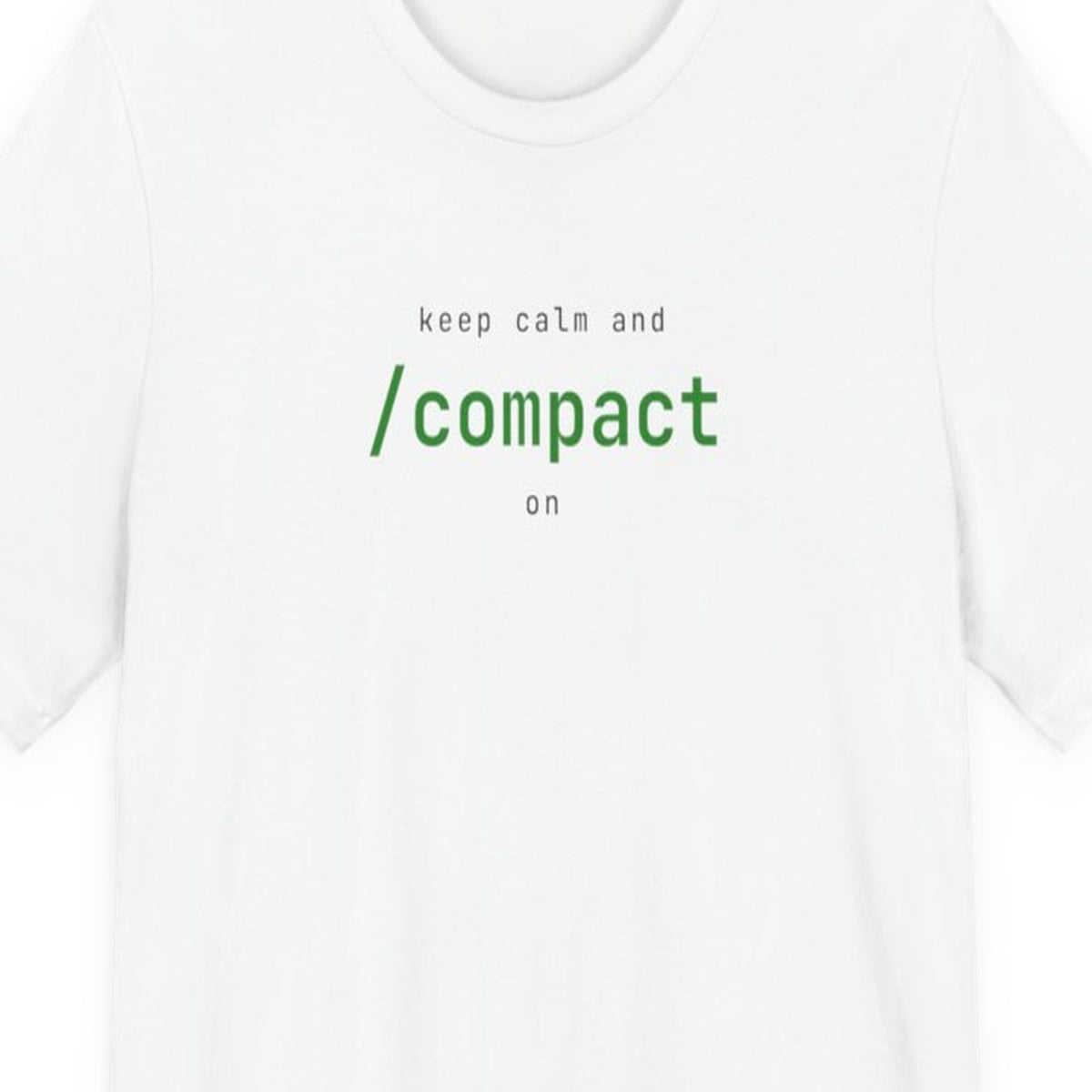 Navy blue t-shirt with white text reading "Keep Calm and /compact On" in classic British poster style