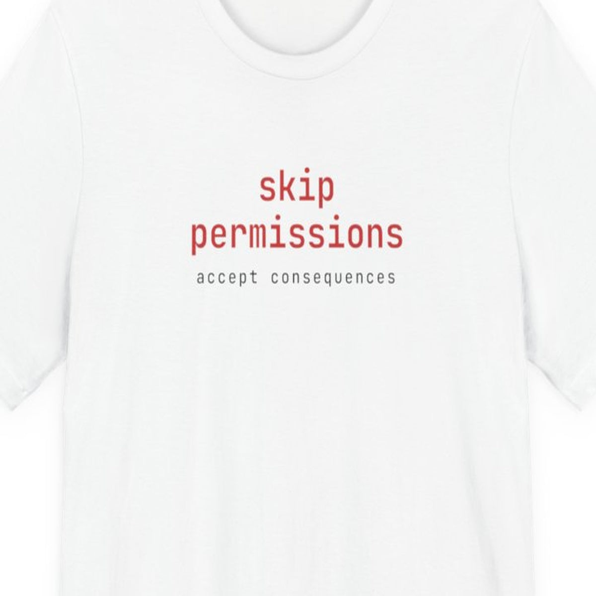 Black t-shirt displaying --skip-permissions in monospace terminal font, coding humor design for developers