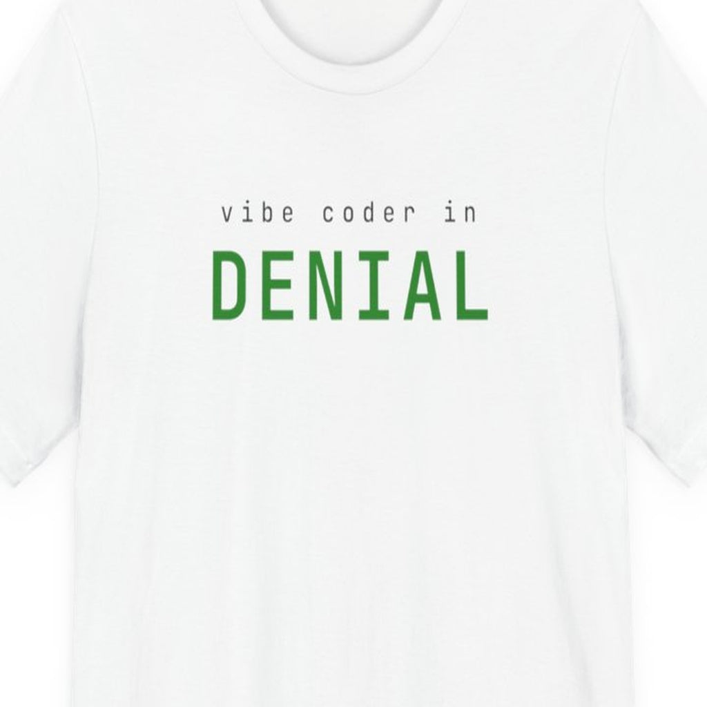 Black t-shirt with "Vibe Coder in Denial" text in amber terminal-style font on dark background