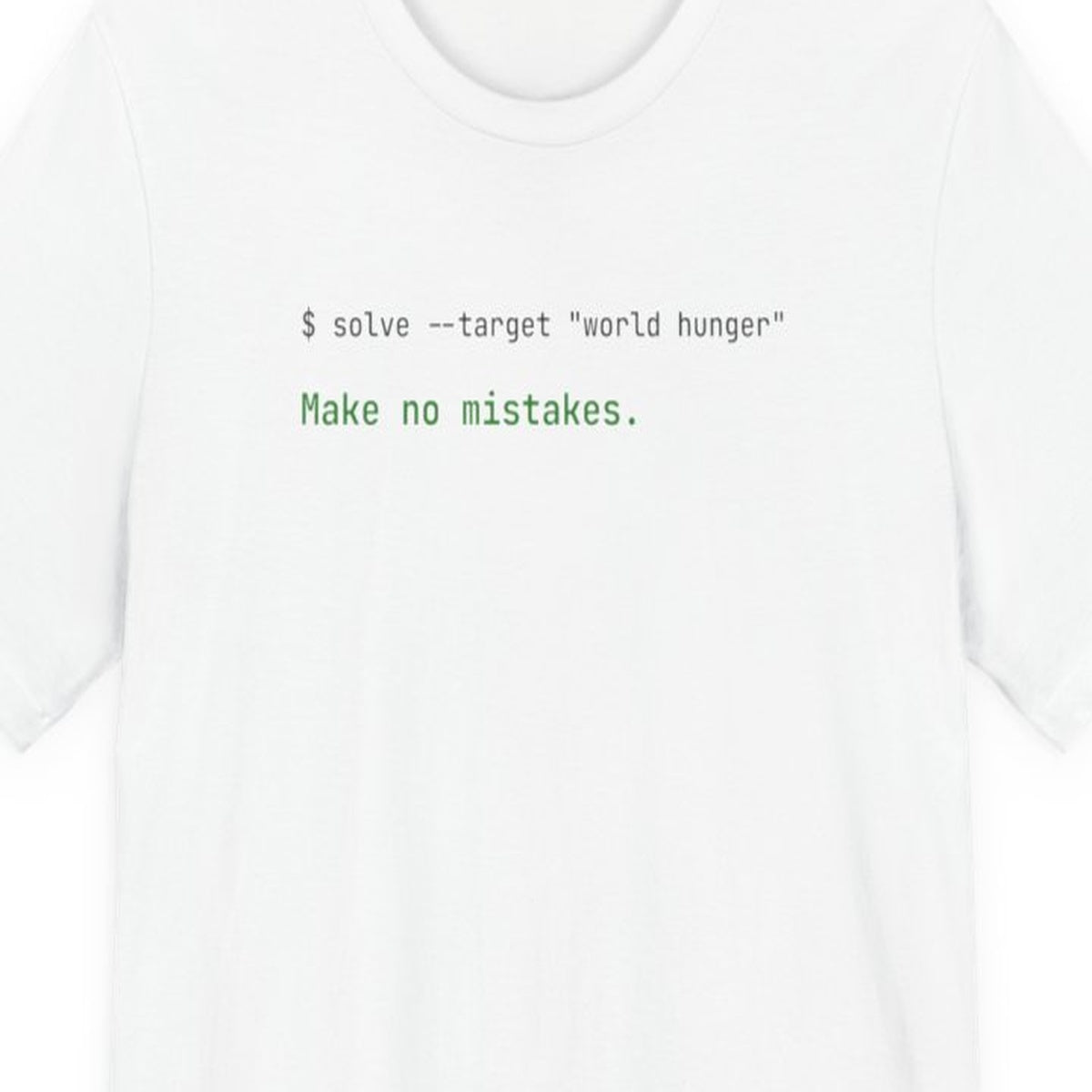 Black t-shirt with white text reading "Solve World Hunger. Make No Mistakes." in monospace terminal font